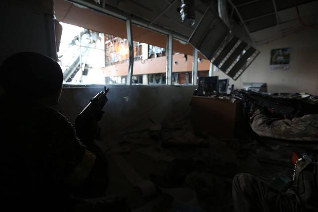 Frozen enfer à l'aéroport de Donetsk. histoire de l'image Замерзший ад в Донецком аэропорту. ФОТОрепортаж